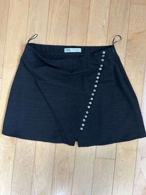 Zara mini with mother of pearl button detail